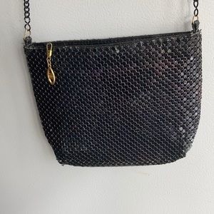 multi chrome purse with a chain strap